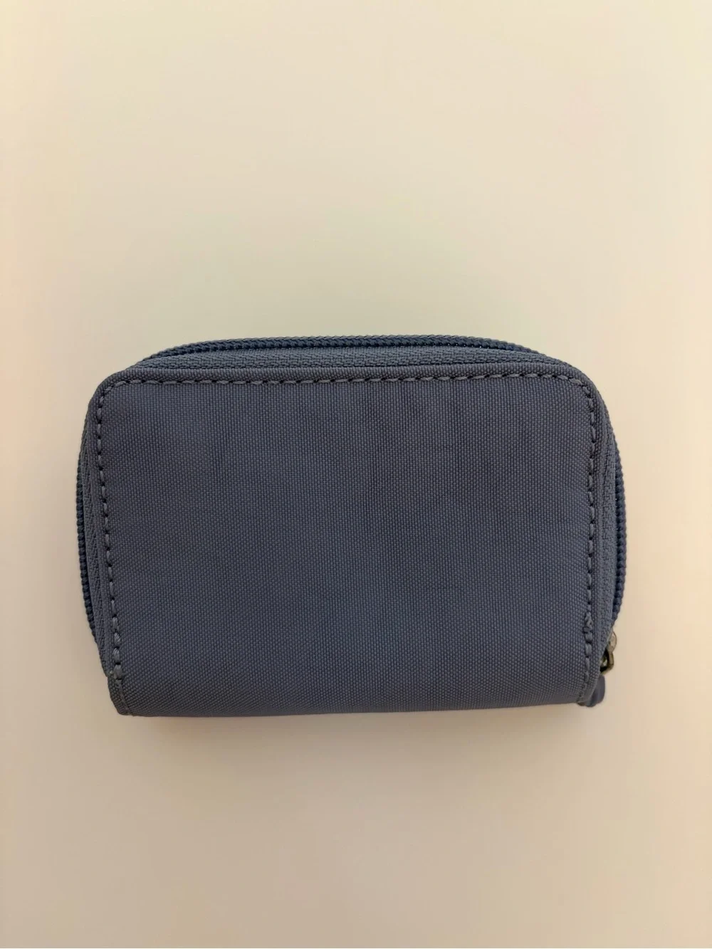 Kipling Zip/button Card Wallet in a purple/Blue